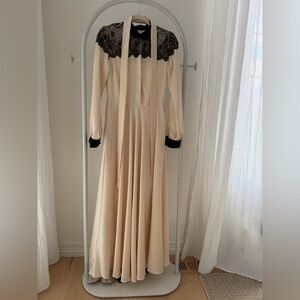 Elegant Cream Maxi Dress with Black Lace Trim